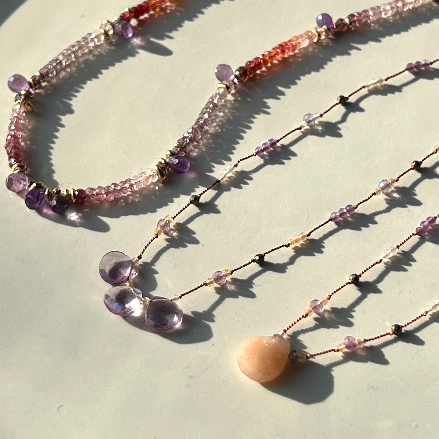 Collier plume pierre de lune pêche